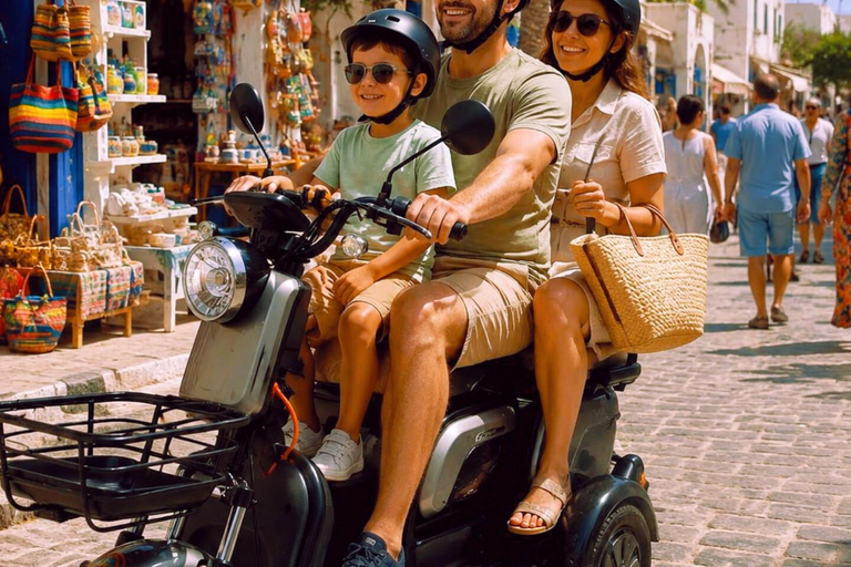 Djerba in Electric Mode: 3 Wheels, 3 Adventurers, Ready to Explore the Island? Djerba: Electric 3-Wheeler Ride for a Fun Family Experience