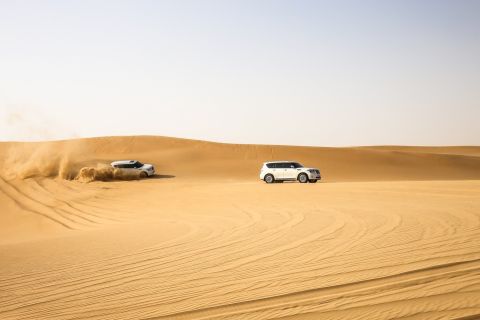 Doha: Desert Safari Dune Bashing, Sandboarding, & Camel Ride
