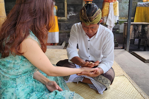 Balinese Purification at holy water temple with Local