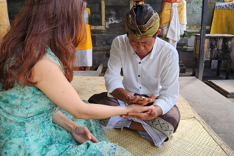 Balinese Purification at holy water temple with Local