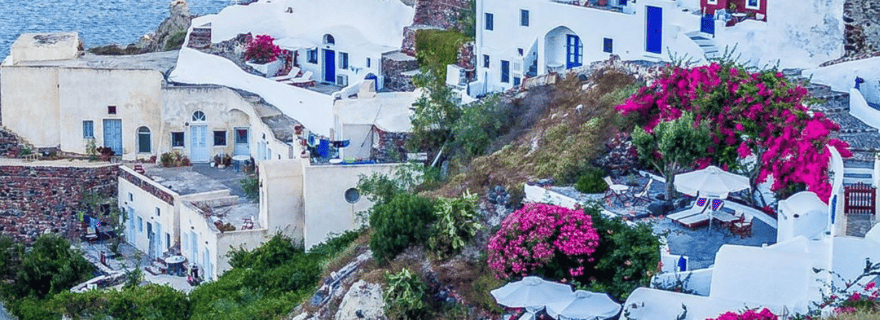 Excursion platine au coucher du soleil à Santorin via les sources d'eau chaude et la plage blanche