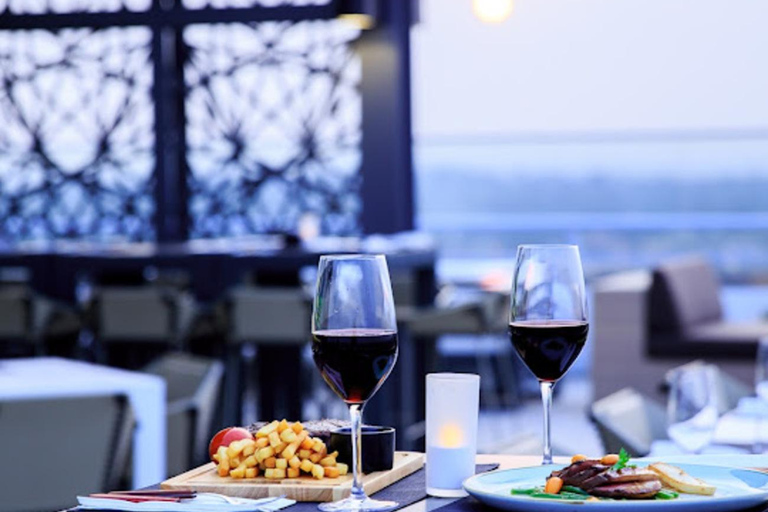 Accra: Instagrammable Nightlife Tour with a welcome drink Accra Tour: 1 Welcome Drink, 360° Skybar Views, & Shopping