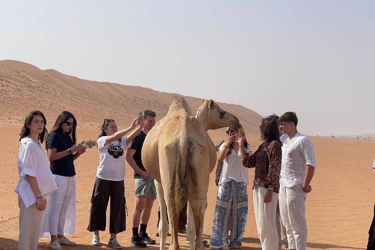 Shared Wahiba Desert Tour with Wadi, Cave, Bedouin & Sunset