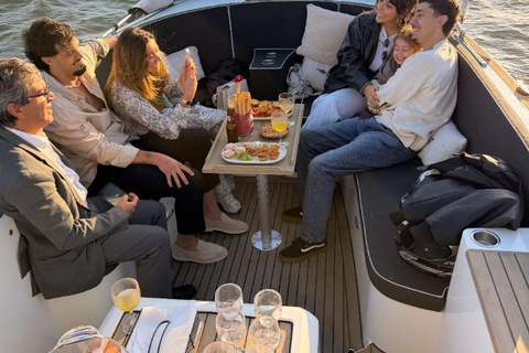 Lisbon Sunset Luxury Boat Vibes with Drinks & Pizza Lisbon Luxury Cozy Cruise with Drinks & Pizza