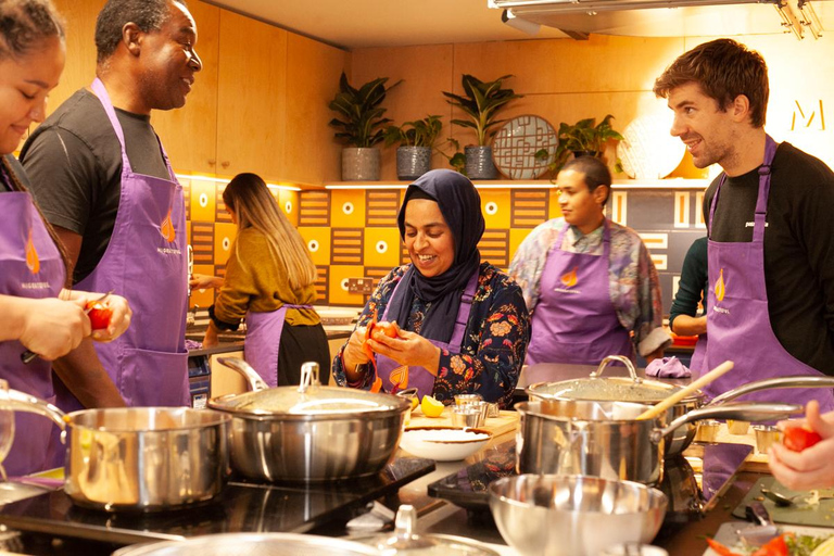 Bristol: Cook Authentic Family Recipes with a Refugee Chef Cooking class with drinks, nibbles, and apron souvenir