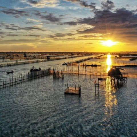 Visit Hue Sunset On Tam Giang Lagoon in Sapa