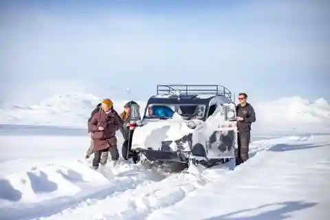 Jotunheimen: Snöbusstur med snöskoteråkning och lunch