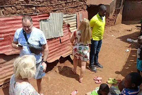 Nairobi: Kibera Slum Walking Tour With Decorated Matatu Ride Kibera Slum Walking Tour And Matatu Ride With Hotel Pickup.