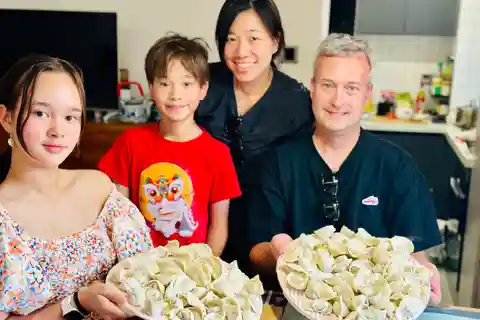 Pekín: Clase de elaboración de dumplings con visita al Mercado Húmedo