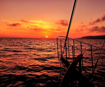 Argostoli: Sunset Cruise with Swim Stops, Dinner, and Wine