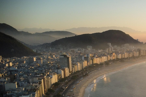 See the Sunrise in Copacabana from a Stand Up Paddleboard with Photos