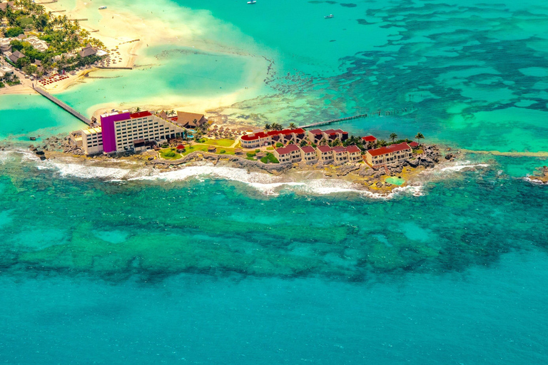 Catamaran Ride with Snorkeling, Open Bar, and Lunch from Isla Mujeres Catamaran Ride: Snorkel, Open Bar, Lunch & Hotel Pick-Up