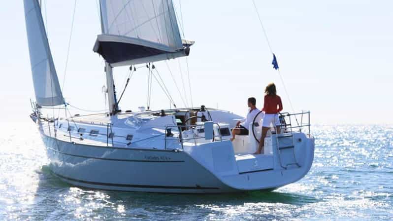 From San Teodoro: Sailing Trip to Tavolara with Lunch