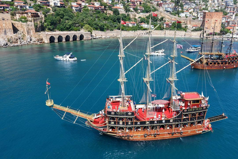 Alanya: Pirate Ship Cruise with Daytime or Sunset Option Sunset Pirate Ship Cruise with Dinner & Soft Drinks