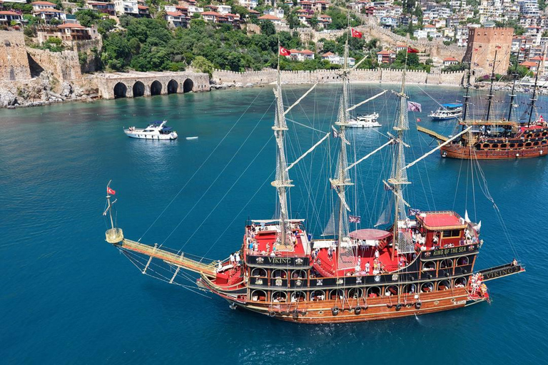 Alanya: Pirate Ship Cruise with Daytime or Sunset Option Sunset Pirate Ship Cruise with Dinner & Soft Drinks