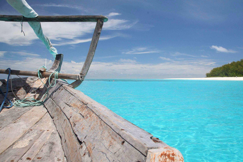 Dolfijnentour + snorkelen bij Mnemba eiland Halve dagDolfijnen Tour & snorkelen bij Mnemba Island .