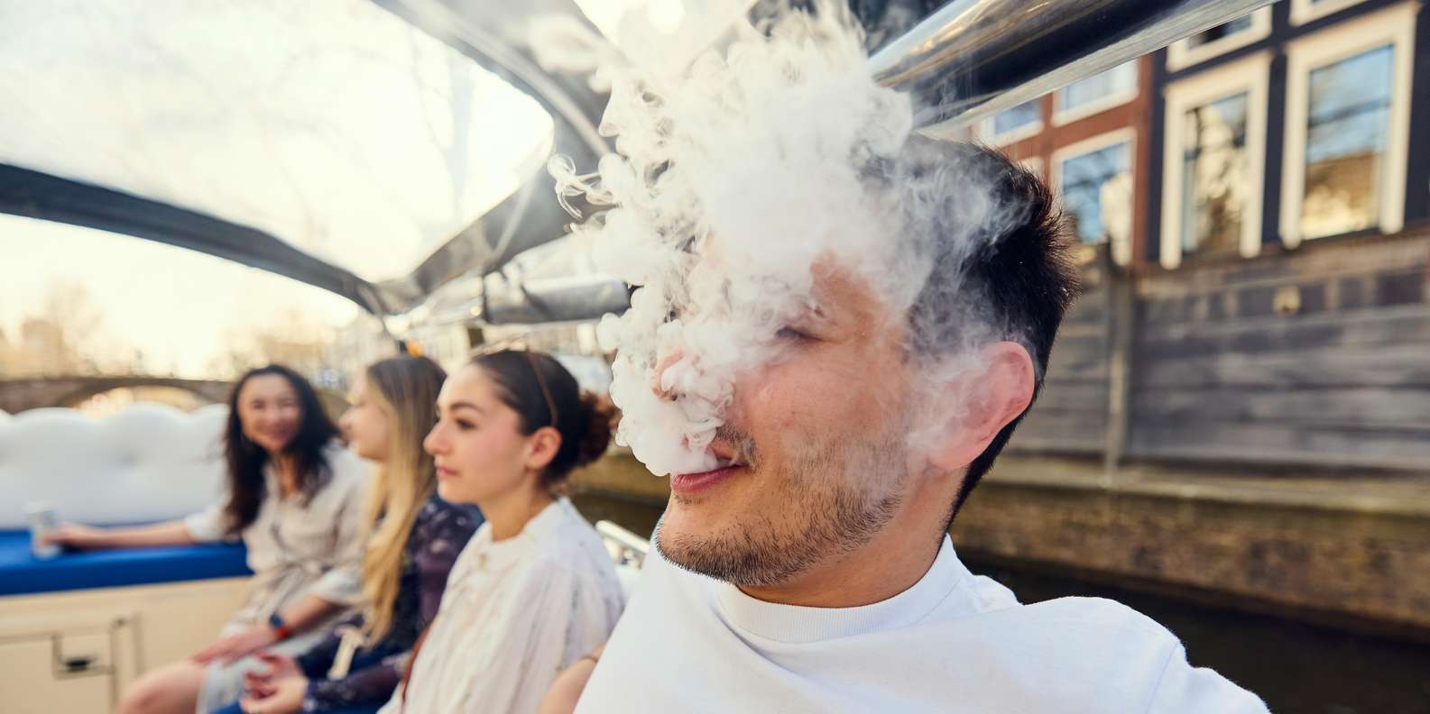 Amsterdam: Smoke & Cruise on covered Cannabis Boat With Bar