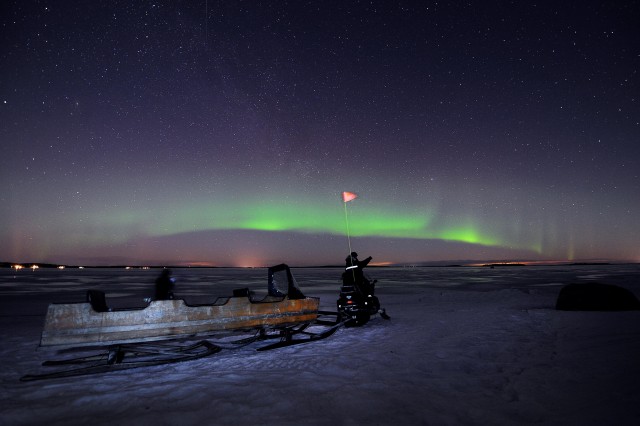 Visit Luleå  Northern Lights Tour on a Snowmobile drawn Sled in Lulea