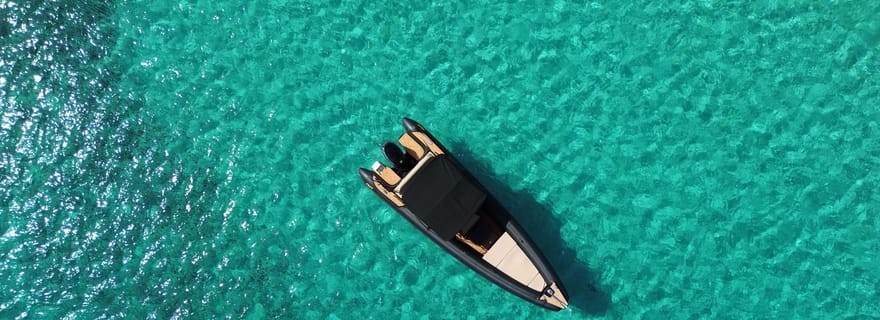 Paros : Tour en bateau au coucher du soleil à Antiparos avec vin