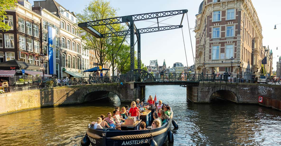 Afbeelding 10 van Amsterdam: begeleide open boottocht met onbeperkt drankjes