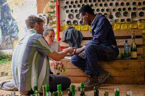 Kampala: Glassblowing, Beadmaking, and More Art Experience Blowing Glass Bubbles