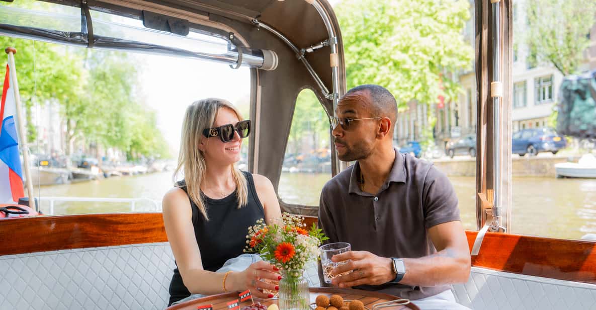 Amsterdam Small Group Canal Cruise Including Snacks & Drinks — a boat tour from Amsterdam, Netherlands