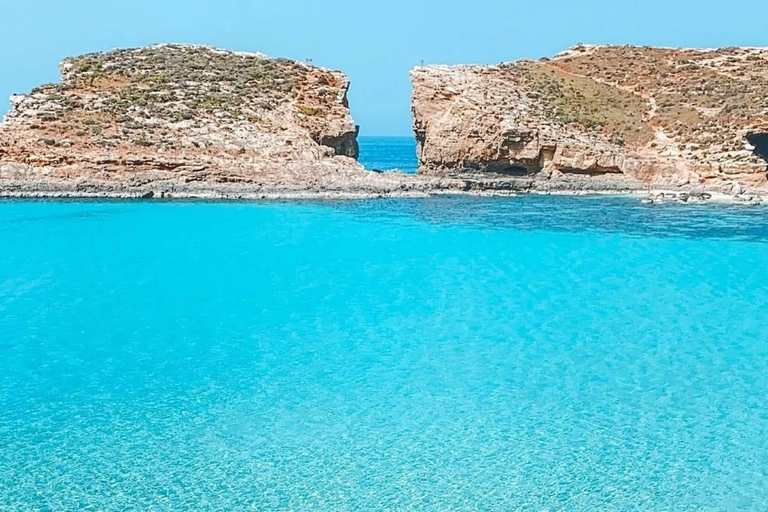 Bugibba: Round Comino, Blue & Crystal Lagoons + Caves evening sunset cruise