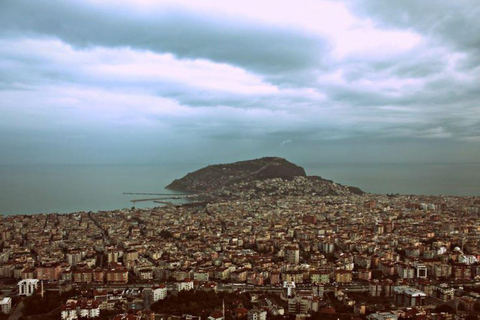 Alanya: City Tour with Cable Car and Damlatas Cave 3 in 1 Alanya: City Tour with Cave acces and cable car ticket.