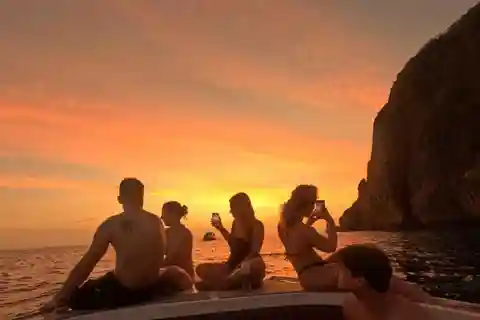 From Phi Phi Island: Maya Bay Sunset & Plankton by Speedboat