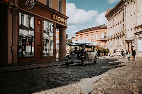 Riga: Electric Car Tour with Wine and Cheese Tasting