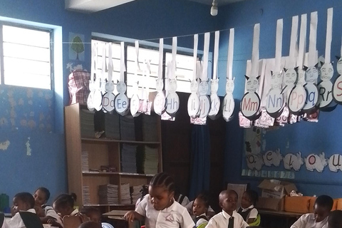 Zanzibar: Stone Town Tour and School Visit with Hassan Discover Town and School Visit with Hassan