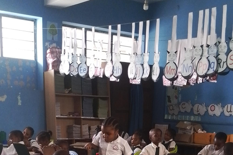 Zanzibar: Stone Town Tour and School Visit with Hassan Discover Town and School Visit with Hassan