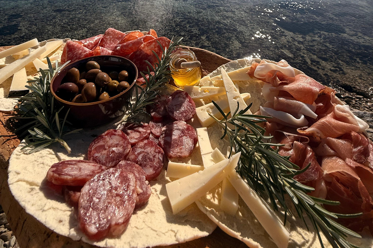 Golfo Aranci: transparent or traditional kayak, dolphins, and aperitif Sunset Tour in a Traditional Kayak with Aperitivo and Dolphins