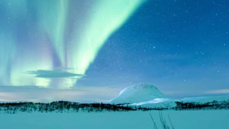 Kilpisjärvi: Northern Lights Snowmobile Tour with Photos