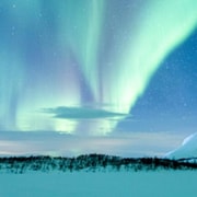 Kilpisjärvi: Nordlichter-Schneemobiltour mit Fotos
