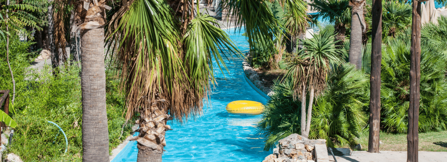 Depuis Réthymnon : journée au parc aquatique avec transfert en bus et guide