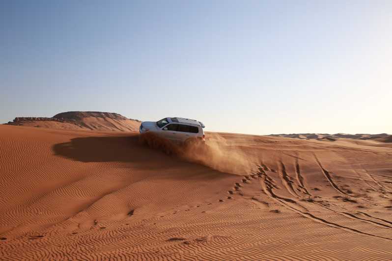 Dubai: Red Dune Safari, Camel Ride, Sandboard & BBQ Options | GetYourGuide