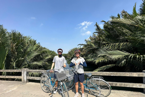Hoi An Bike Tour: Ride a Buffalo & Duck Farming Experience Hoi An Bike-Organic Farm-Duck game-ride Buffalo-Basket boat