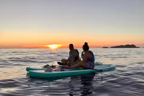 Cours de paddle surf, visite de grottes et criques secrètes, plongée avec tuba