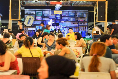 Dîner issu d&#039;un cours de cuisine et découverte du marché nocturne local