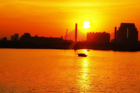 Sunset Cruise: Marvel at amber gold skies as the sun sets.