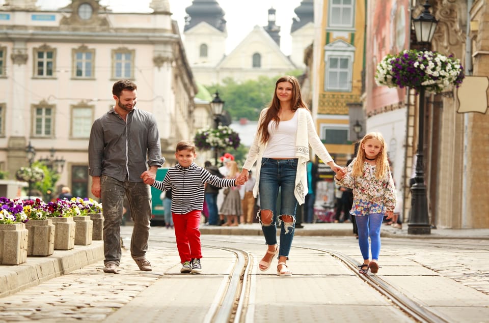 Parents and children exploring a European city together