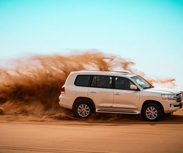 Doha: 4x4 Desert Safari with Camel Ride & Sandboarding