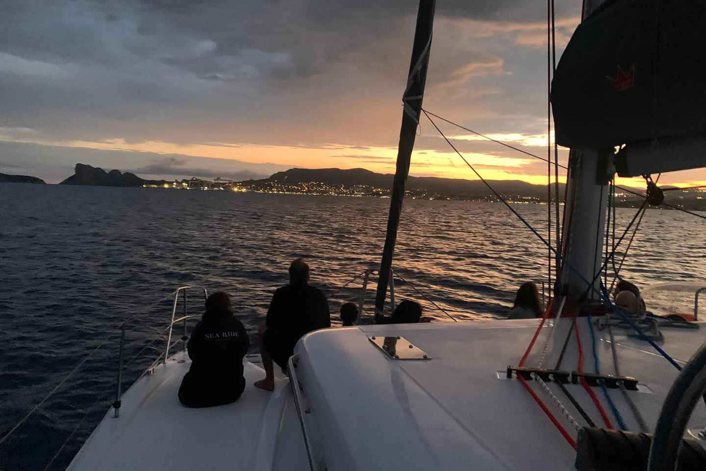 Departure from BRUSC sunset on sailing catamaran