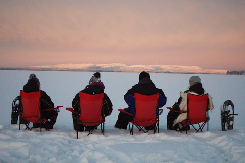 Snowshoe experience with traditional beverages in Lapland