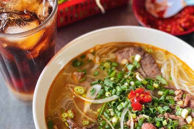 Hue: Night Street Food Tour by Cyclo with a Local Guide