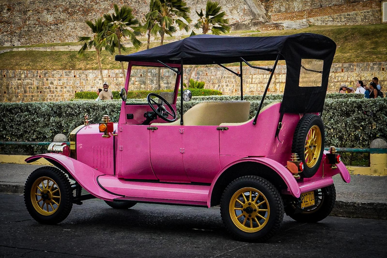 From the Historic Center to Castillo San Felipe in a vintage electric car From the Historic Center to San Felipe Castle in a vintage electric car