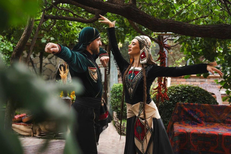 Tbilisi: Georgian Dinner, Wine & Folk Show with Pickup