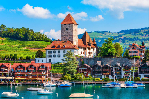 Tour privato in auto della capitale svizzera, dei castelli e dei laghi da Lucerna