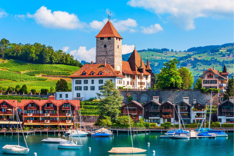 Tour privato in auto della capitale svizzera, dei castelli e dei laghi da Lucerna